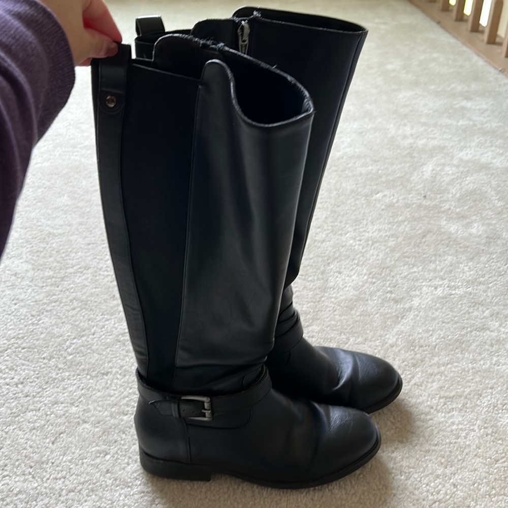 Tall black boots